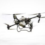 A drone flying over a geological site, collecting data for surveying purposes.