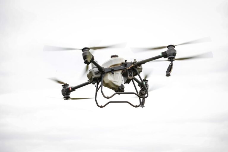 A drone flying over a geological site, collecting data for surveying purposes.